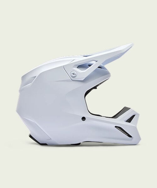 white v1 helmet on green background