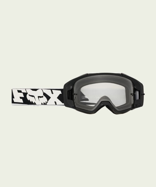 Black goggles on green background