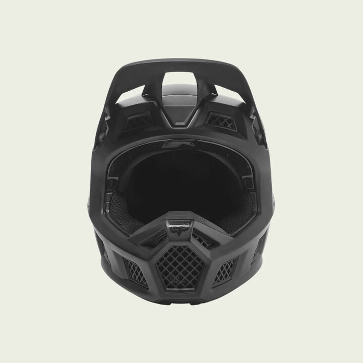 Black V3RS motocross helmet on a white background.