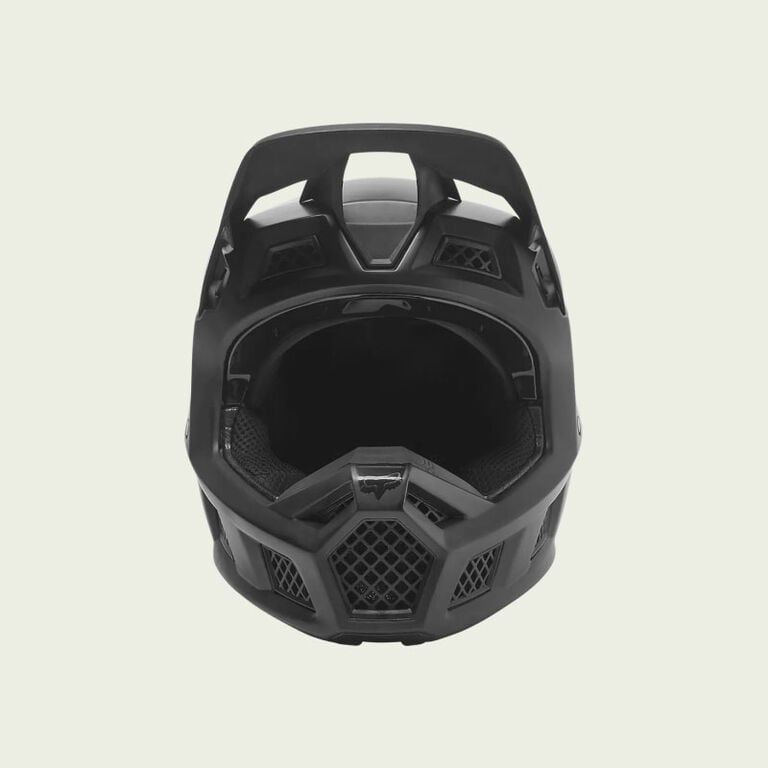 Black V3RS motocross helmet on a white background.