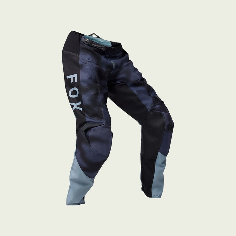 Black dirt bike pants with white stripes. 