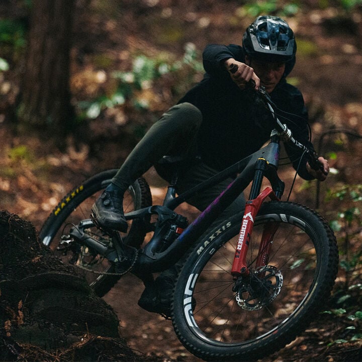 Rider going biking DH in Fox gear