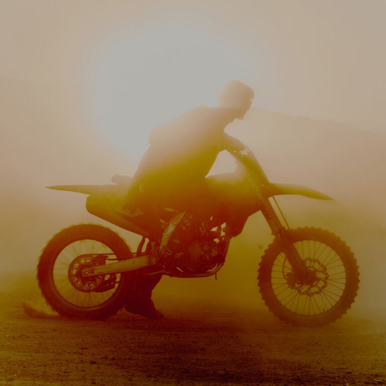 Person wearing Fox LAB on moto bike