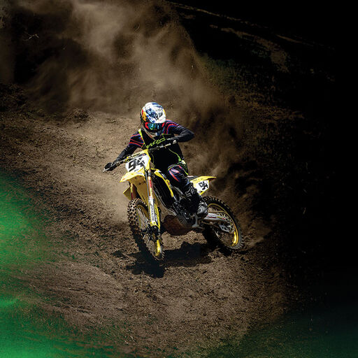 mx dirt rider rider going down a hill