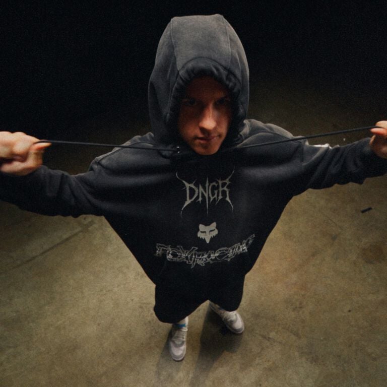 Close up of Haiden Deegan with DNGR tee and hat