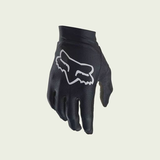 Black mountain bike glove on white background. 