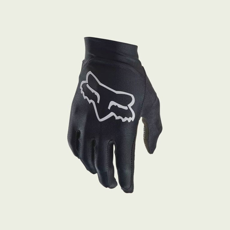Black mountain bike glove on white background. 