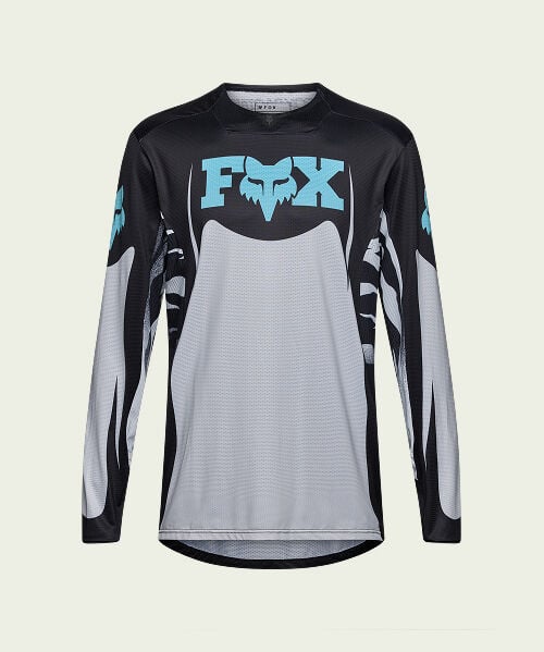 black jersey on green background
