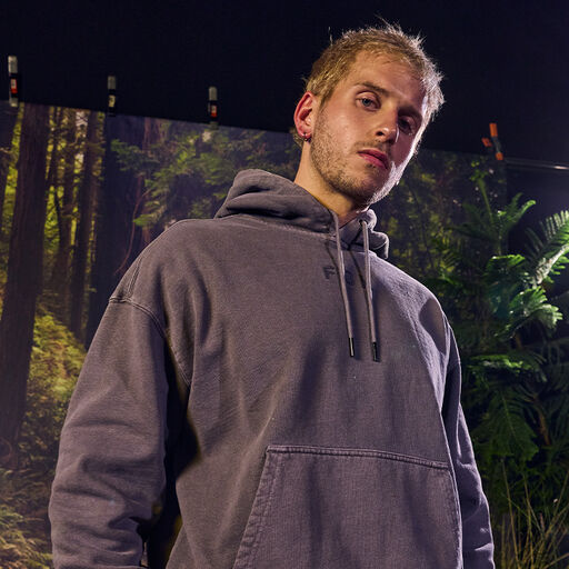 Man wearing a Fox Wordmark hoodie