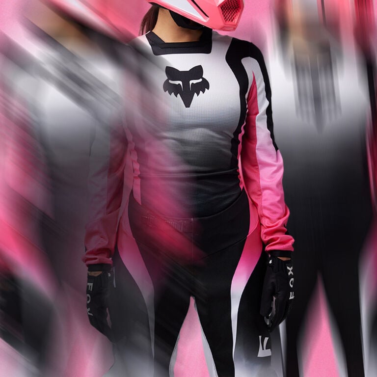 woman in pink, black, and white jersey