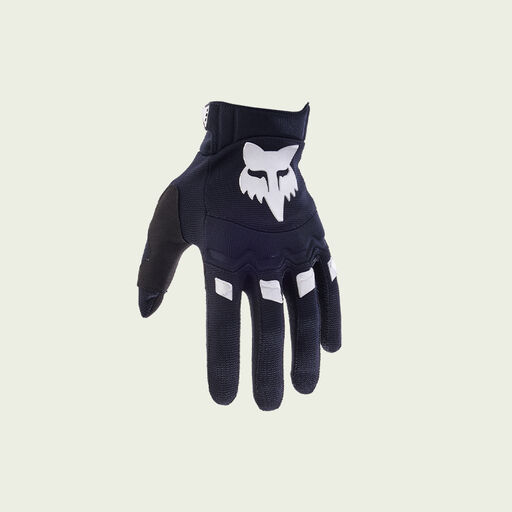 black and white glove on green background