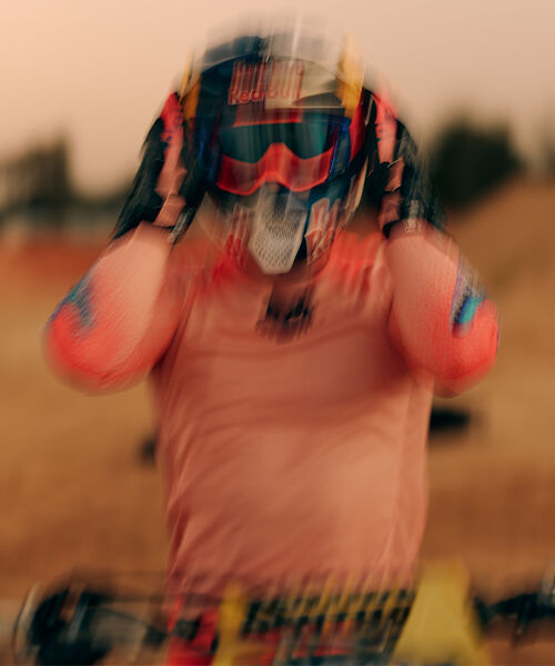 Blurred image of an MX rider in the Second Nature Vision LE kit