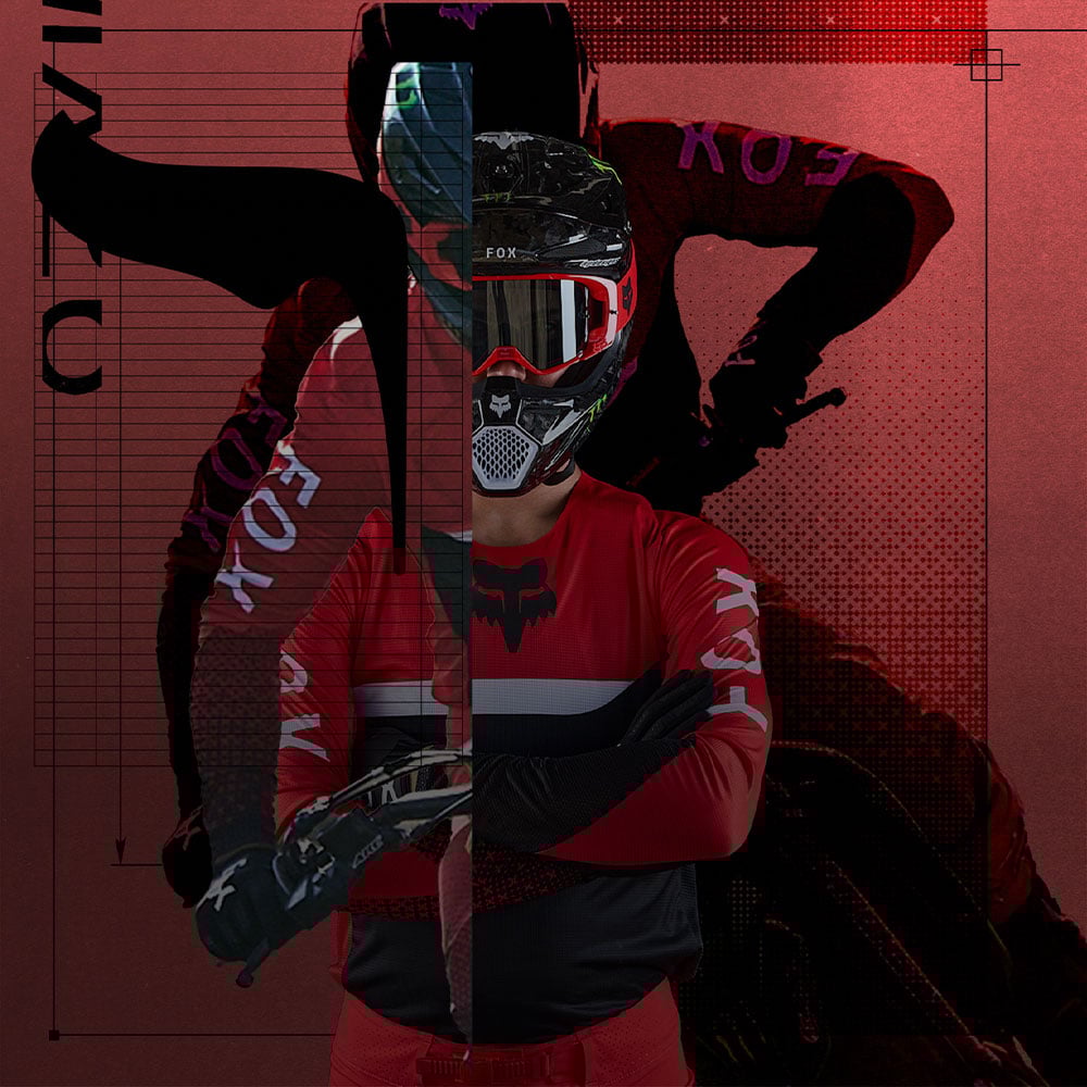 Person standing in MX26 gear with rider in background